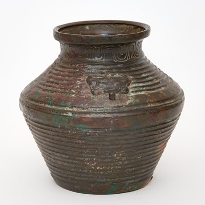 Lot 169 - An Archaistic Chinese Ribbed Bronze Twin-Handled Vase