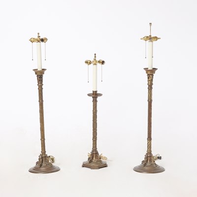Lot 155 - Pair of Oscar Bach for Segar Studios Patinated Metal Candlestick Lamps