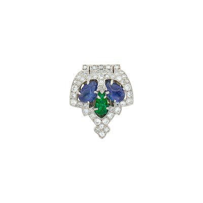 Lot 214 - Cartier Platinum, Carved Sapphire and Emerald and Diamond Clip