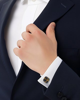 Lot 25 - Verdura Pair of Gold and Black Onyx Cufflinks