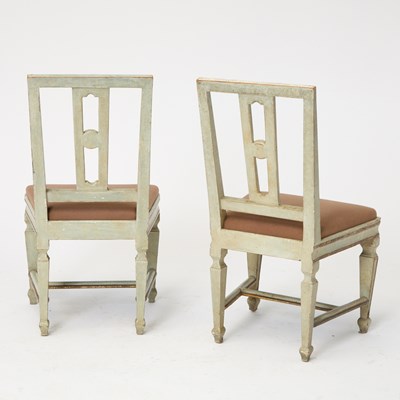 Lot 570 - Set of Six Swedish Gustav III Style Painted and Parcel-Gilt Dining Chairs