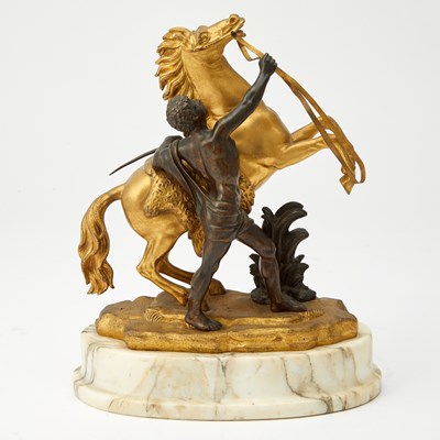 Lot 114 - Parcel-Gilt and Patinated Bronze Group of a Marley Horse and Attendant