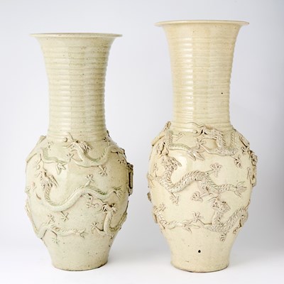 Lot 136 - Pair of Chinese Pottery Dragon Vases