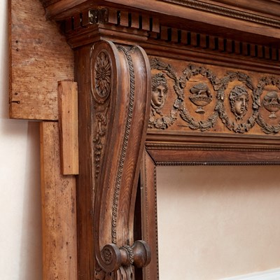 Lot 145 - Continental Neoclassical Walnut Fireplace Surround