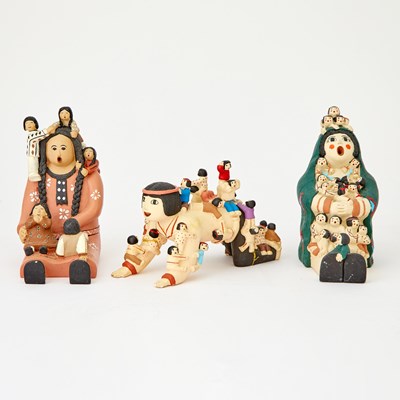 Lot 509 - Group of Four Pueblo Resin Storytellers