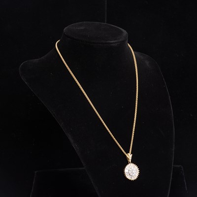 Lot 301 - 14Kt Gold and Diamond Pendant Necklace