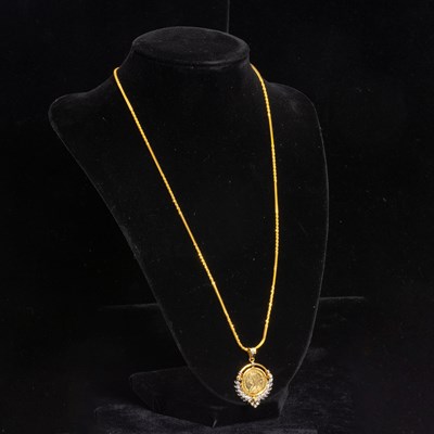 Lot 311 - Two-Color Gold, Gold Coin and Diamond Pendant and High Karat Gold Chain Necklace