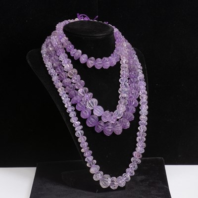 Lot 313 - Four-Strand Fluted Amethyst Beaded Necklace