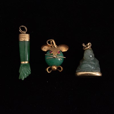 Lot 321 - Group of Three Gold and Jade Stone Pendants