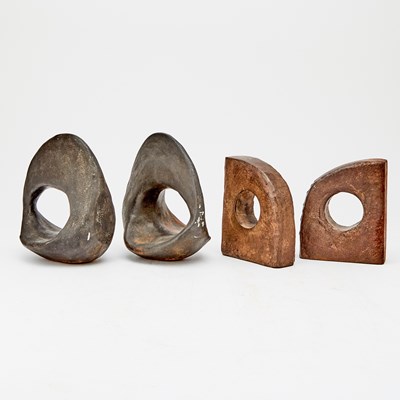Lot 230 - Two Pairs of Lisa Hoke Cast Iron Abstract Sculptural Bookends