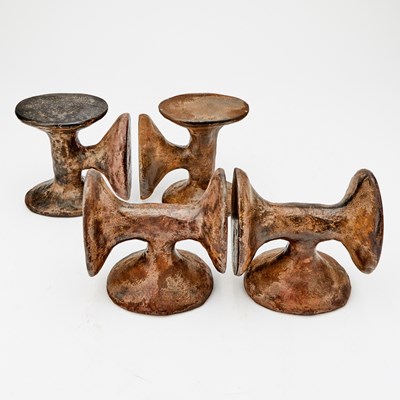 Lot 231 - Two Pairs of Lisa Hoke Cast Iron Abstract Sculptural Bookends