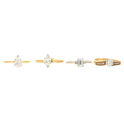 Lot 1250 - Four Yellow and White Gold and Diamond Rings