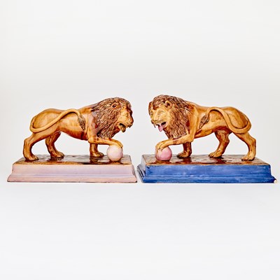 Lot 248 - Pair of English Rockingham Style Glazed Pottery Figures of Lions