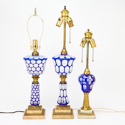 Lot 352 - Three Blue Milk Glass Lamps