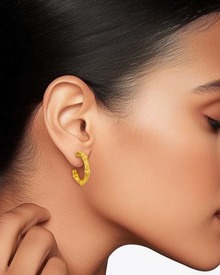 Lot 2 - Tiffany & Co. Gold Bamboo Bangle Bracelet and Pair of Hoop Earrings