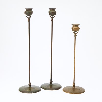 Lot 136 - Three Tiffany Studios Bronze Candlesticks