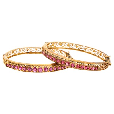 Lot 1226 - Pair of Gold and Ruby Bangle Bracelets