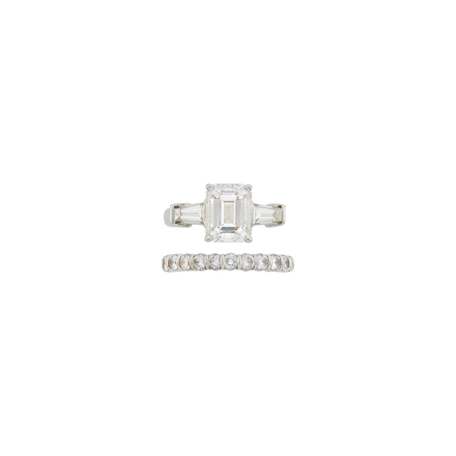 Lot 192 - Platinum and Diamond Ring and Guard Ring