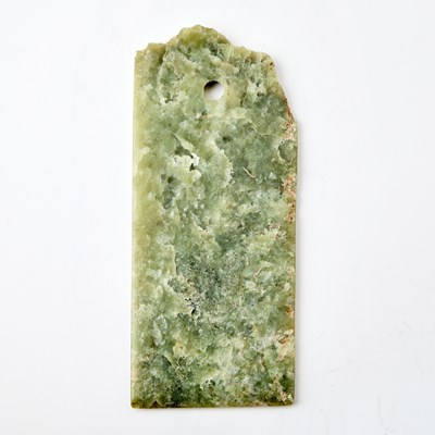 Lot 314 - A Chinese Archaic Mottled Jade Yue