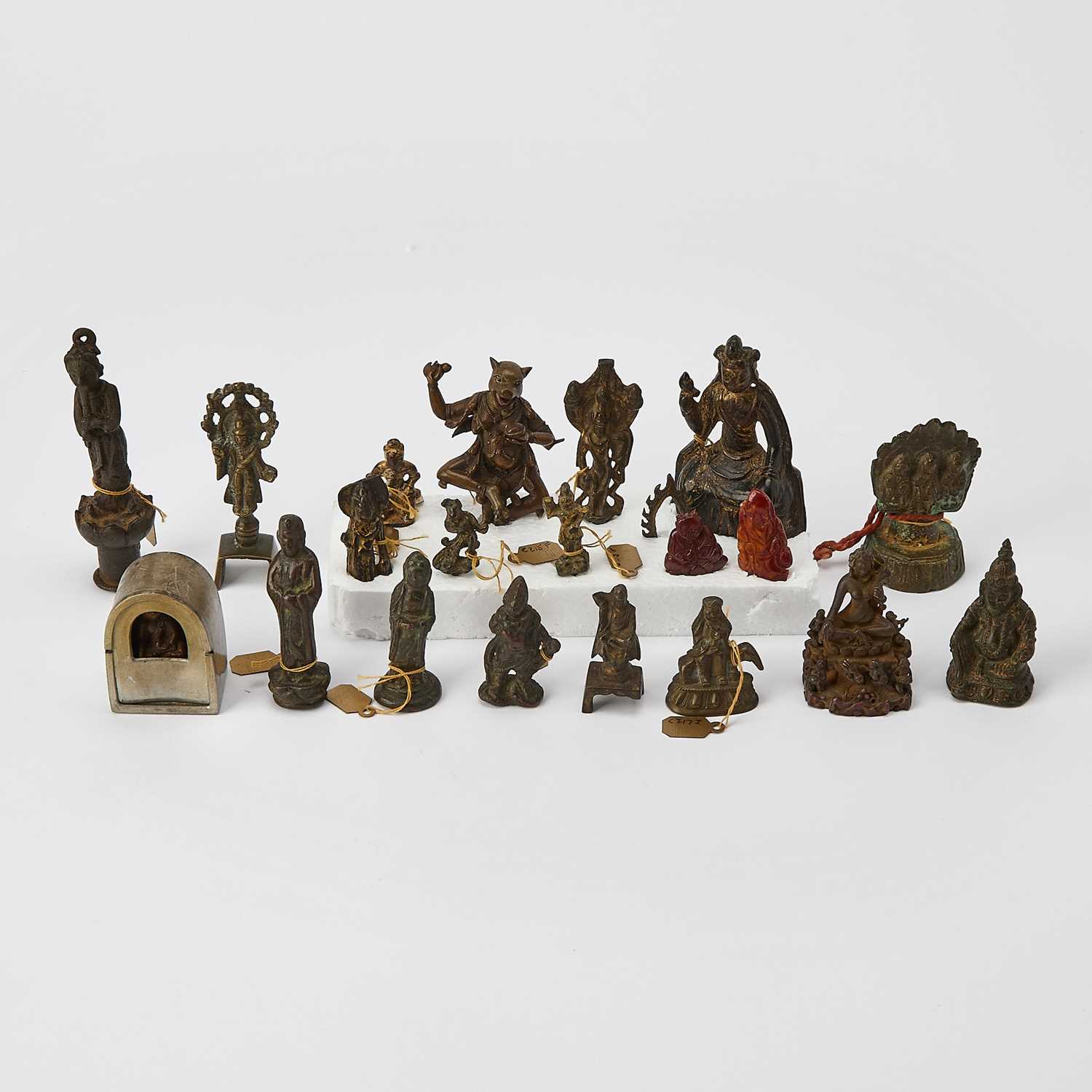 Lot 616 - A Group of Chinese and Himalayan Miniature Bronze Votive Figures