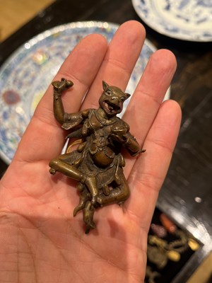 Lot 616 - A Group of Chinese and Himalayan Miniature Bronze Votive Figures