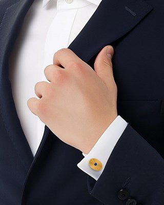 Lot 28 - Cartier Pair of Gold and Sapphire Cufflinks