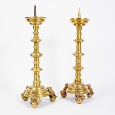 Lot 543 - Pair of South German Brass Pricket Candlesticks