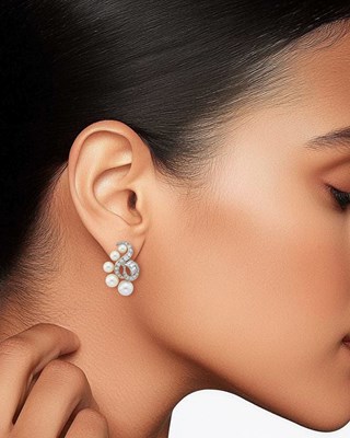 Lot 51 - Marianne Ostier Pair of Platinum, Cultured Pearl and Diamond Earclips