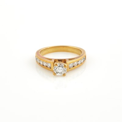 Lot 112 - Diamond Engagement Ring, 11 diamonds, center stone about 0.40 ct., 10 stones about 0.40 ct.,        18K 3 dwt.