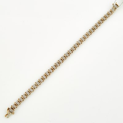 Lot 304 - Diamond Flexible Bracelet, 10K 6 dwt.