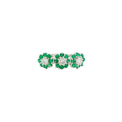 Lot 1217 - White Gold, Emerald and Diamond Floret Ring