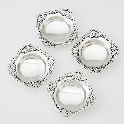 Lot 3223 - Set of Four Dominick & Haff Sterling Silver and Parcel Gilt Butter Pats