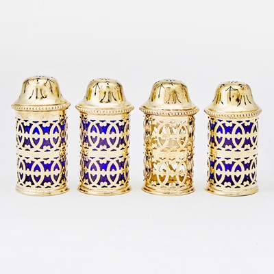 Lot 40 - Set of Four George VI Sterling Silver Gilt and Cobalt Glass Pepper Casters