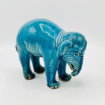 Lot 19 - Chinese Blue Glazed Porcelain Figure of a Standing Elephant