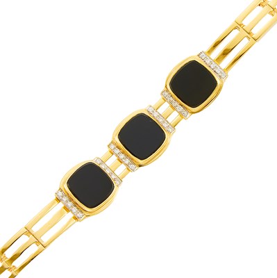 Lot 1017 - Two-Color Gold, Black Onyx and Diamond Bracelet