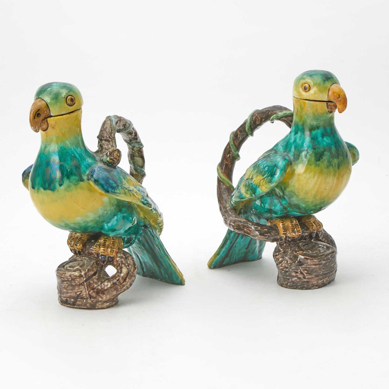 Lot 559 - Pair of Proskau or Glienitz Faience Parrot-Form Jugs and Covers