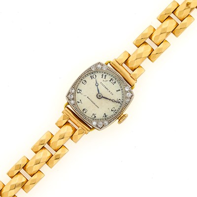 Lot 1076 - Tiffany & Co. Gold, Platinum and Diamond Watch with Gold Bracelet