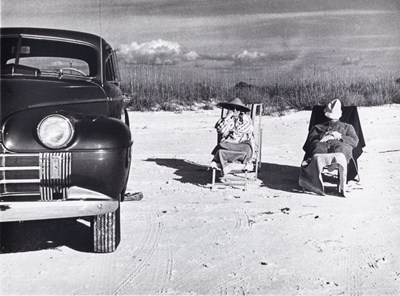 Lot 95 - Marion Post Wolcott, Winter tourists relaxing on beach near trailer park, Sarasota Fla. 1939