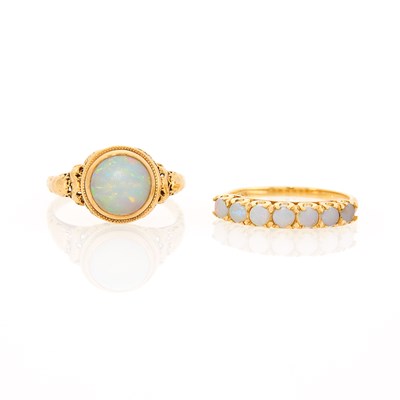 Lot 1133 - Two Gold, Low Karat Gold and White Opal Rings