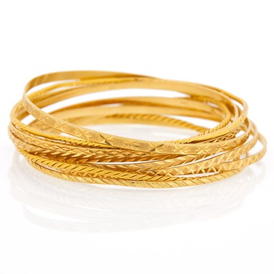 Lot 1043 - Ten Gold Bangle Bracelets