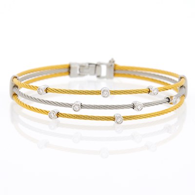 Lot 1042 - Two-Color Gold and Diamond Bracelet