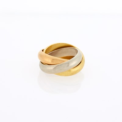 Lot 1015 - Cartier Tricolor Gold 'Trinity' Rolling Band Ring