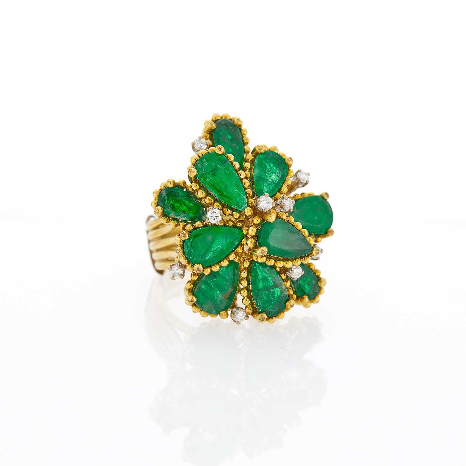 Lot 1071 - Gold, Emerald and Diamond Cluster Ring