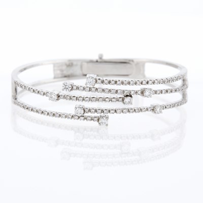 Lot 1183 - White Gold and Diamond Bangle Bracelet