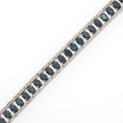 Lot 1187 - White Gold, Sapphire and Diamond Bracelet