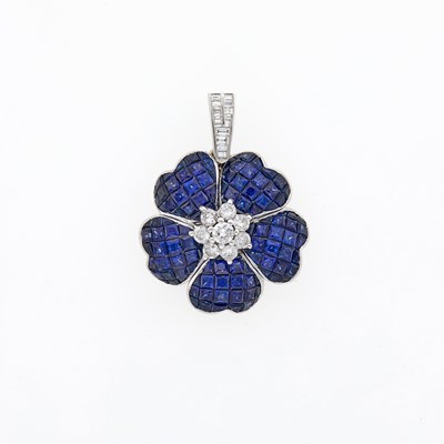 Lot 1176 - White Gold, Invisibly-Set Sapphire and Diamond Flower Pendant