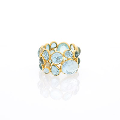 Lot 1046 - Gold and Aquamarine Band Ring