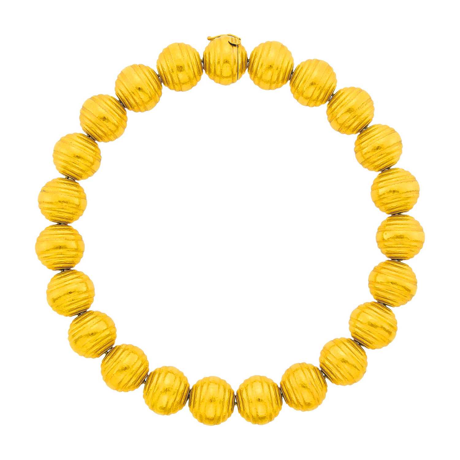 Lot 21 - Ilias Lalaounis Hammered Gold Bead Necklace