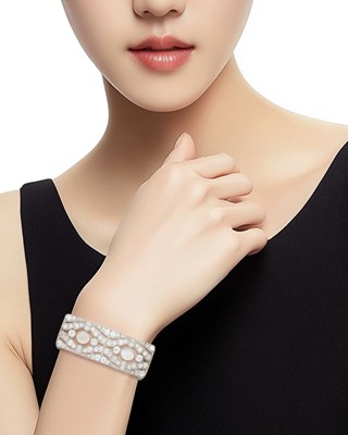 Lot 181 - Platinum, Moonstone and Diamond Bracelet, France