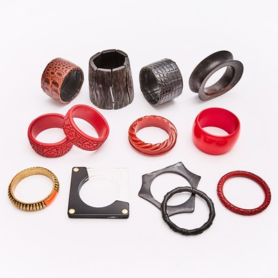 Lot 547 - Group of red and Black Bangle Bracelets